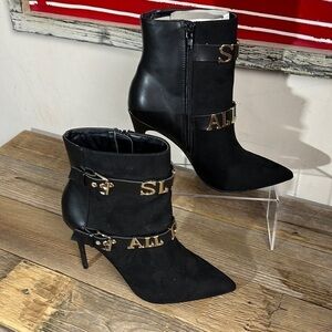 Women’s black shoe dazzle “ slay all Day” heeled boots. Size 8. NWOT.